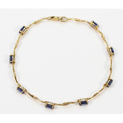 753 - A 9ct gold diamond and sapphire bracelet, 19cm, 4.9g