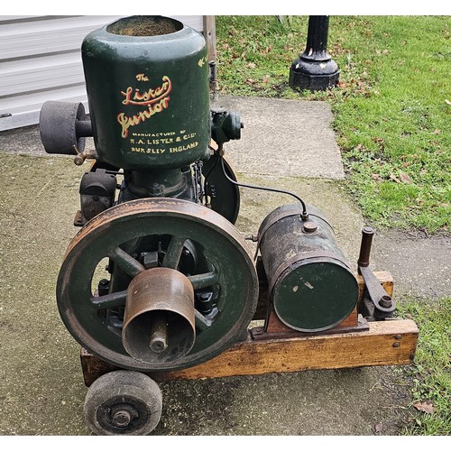 A Lister Junior 3hp A2 stationary engine, serial number 248671, mounted on a bogey and in working order