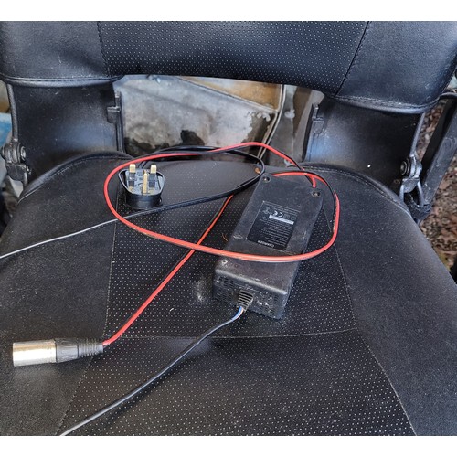 4 - A Pride battery operated wheelchair (untested) together with a modern Karma folding manual wheelchai... 