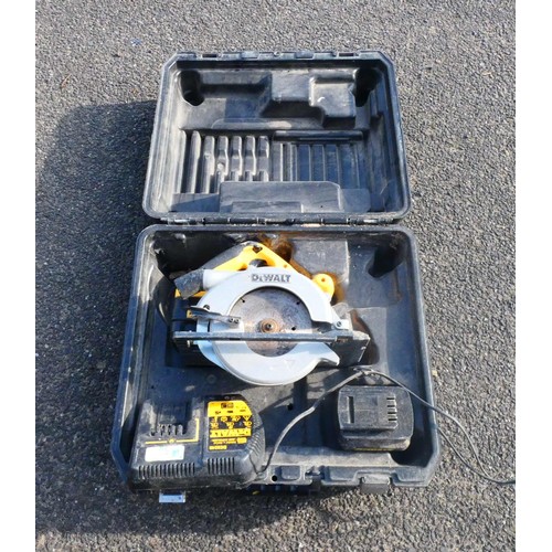 11 - A boxed DeWalt 24v battery circular saw with charger and two batteries.