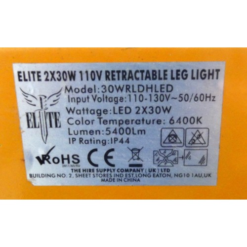 38 - Two Elite 110v 2 x 30w retractable leg lighting units, also an Elite 110v 2 x 50w retractable leg li... 
