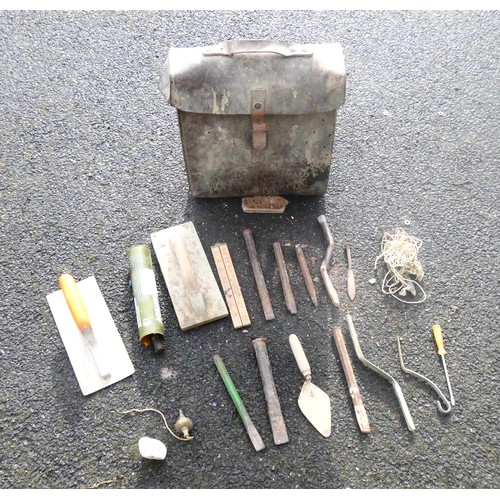 49 - A collection of hand tools to include spirit levels, wood plane, hand saws, mallets, hammers, stilso... 