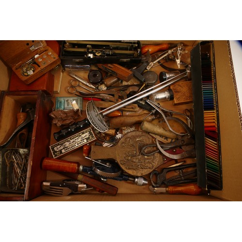 51 - A collection of early to mid twentieth century hand tools to include vintage tin openers, tape measu... 