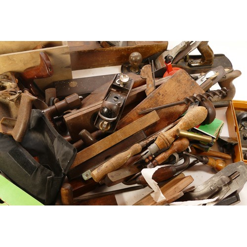 55 - A collection of early to mid twentieth century carpenters hand tools to include, wood planes, block ... 