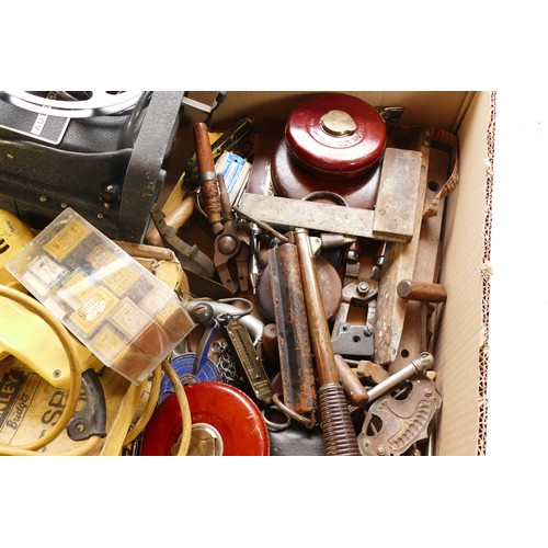 56 - A collection of mid twentieth century hand tools to include, spirit levels, spring balance scales, t... 