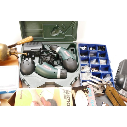 57 - A collection of mid twentieth century tools to include tape measures, garden hand tools, brass sprin... 