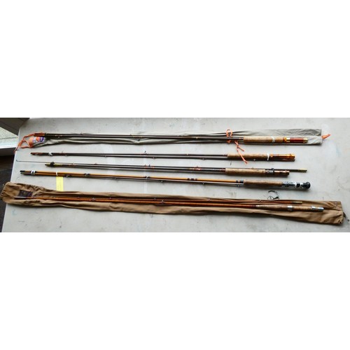 A collection of five vintage fly fishing rods to include manufacturer ...