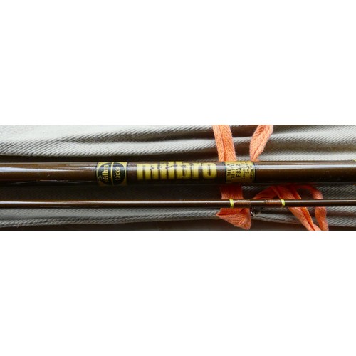 A collection of five vintage fly fishing rods to include manufacturer ...