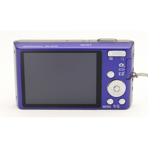 A Sony Cybershot Steadyshot DSC-W730 digital camera, in purple.