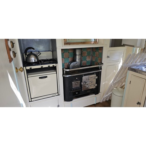 180 - Showman's Caravan, c.1950/60, typical three bay layout with adult bedroom to the front, with bed and... 