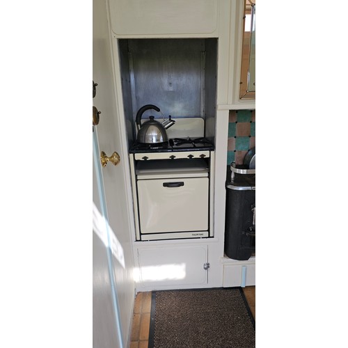 180 - Showman's Caravan, c.1950/60, typical three bay layout with adult bedroom to the front, with bed and... 