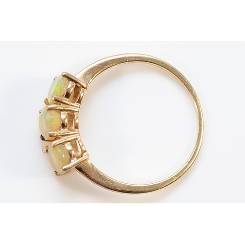 5 - A 9ct gold fire opal three stone ring, S, 2.1g