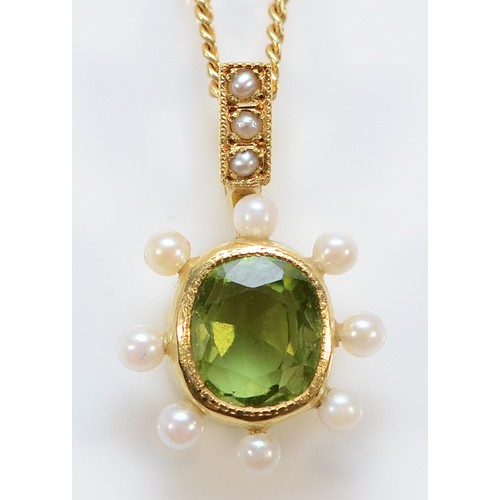 An 18ct gold seed pearl and peridot pendant with a chain, 6mm x 5mm peridot, 4.3g