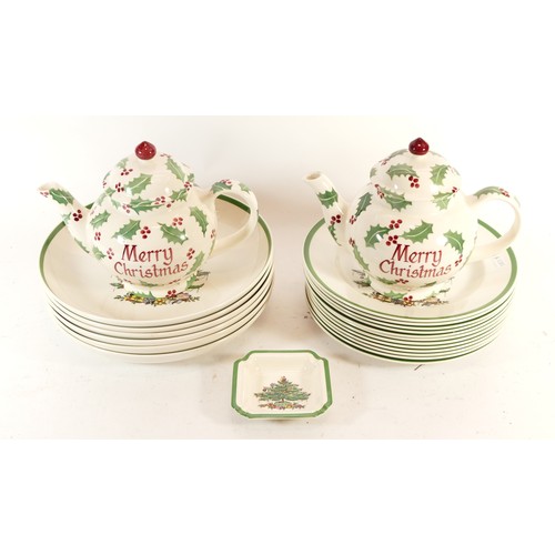 A pair of Emma Bridgewater ceramic Christmas themed teapots, 18cm tall, together with twelve Spode Christmas dinner plates.