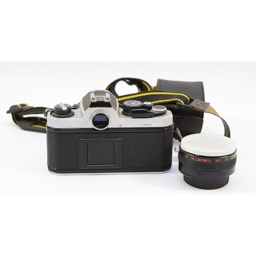 A Nikon FM2 film camera with a Nikon Nikkor f/1.8 50mm lens.