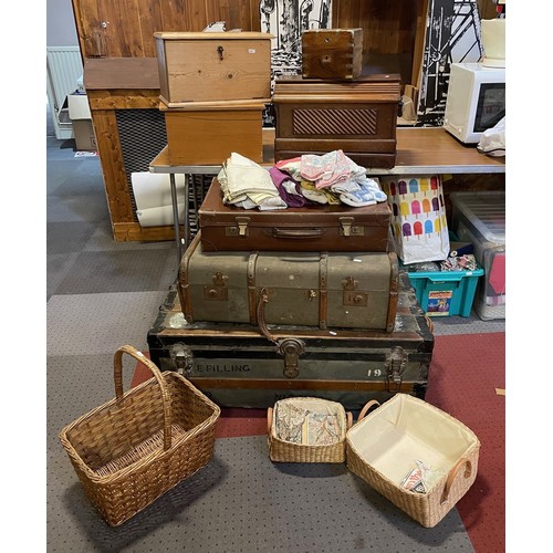 A Singer manual wind sewing machine, in oak case, together with three ...