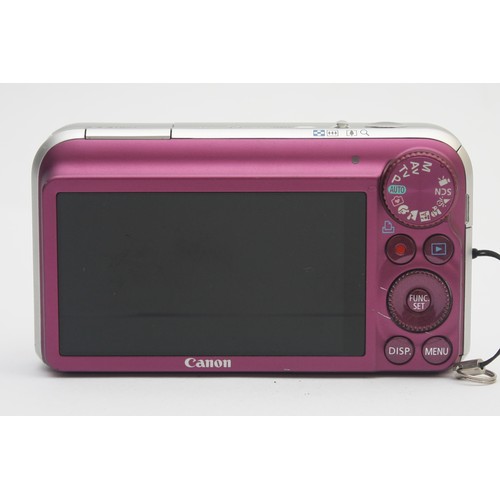 A Canon Powershot SX210 IS digital camera, in purple.