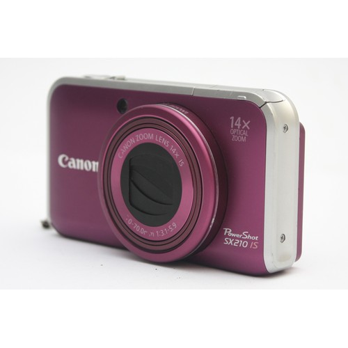 A Canon Powershot SX210 IS digital camera, in purple.