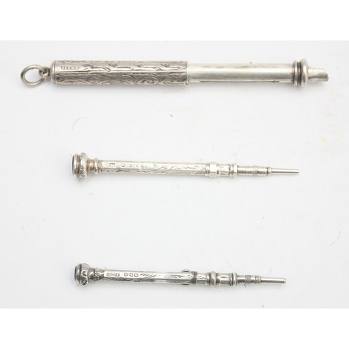 Three silver propelling pencils, Chester 1899, Birmingham 1897
