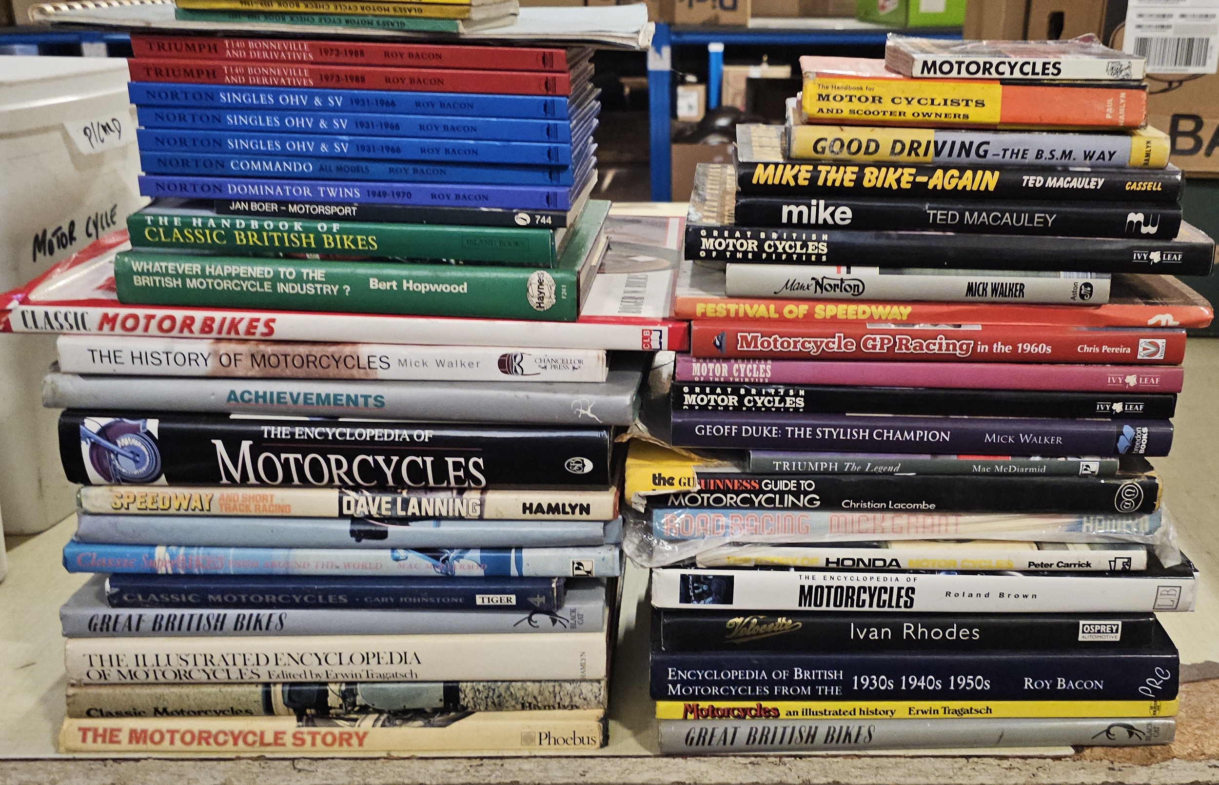 A large collection of motorcycle related books