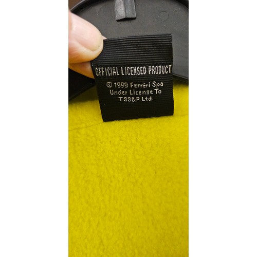 26 - An official Ferrari black/yellow fleece, size S, unworn, c.1999.