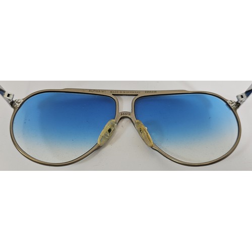 28 - A vintage pair of Alpina M1 Aviator hand made sunglasses, size 60 12, blue graduated lenses, numbere... 