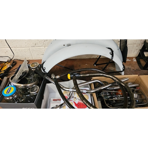 126 - A pair of 1960's Triumph 90 mudguards various spares and two chains with keys