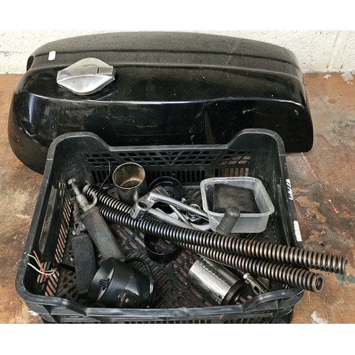 130 - A Norton fibreglass tank and various spares