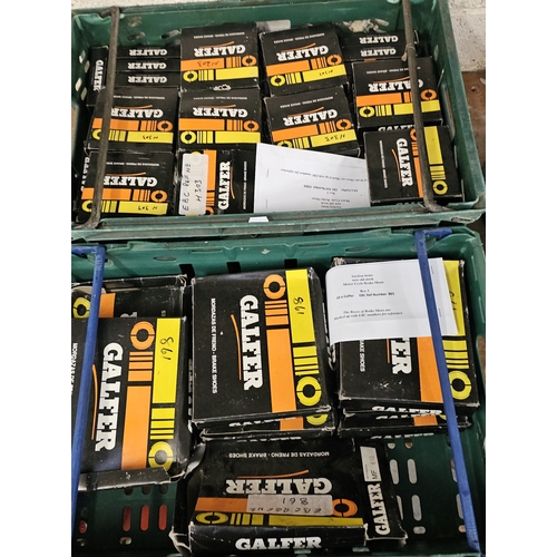 134 - Two crates of motorcycle brake shoes, see list