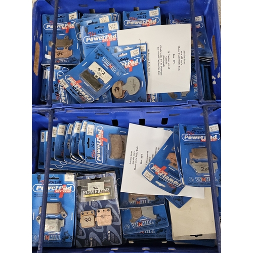 135 - Two crates of motorcycle brake shoes, see list