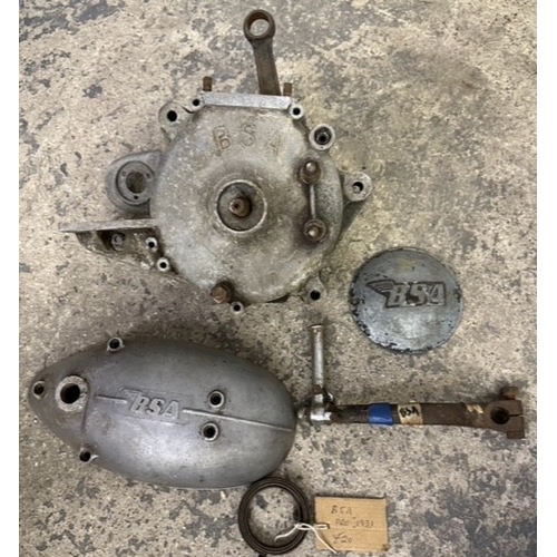 157 - A collection of BSA motorcycle parts, to include a pair of crankcases with conrod, serial number B.3... 