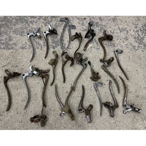 162 - A collection of vintage and veteran motorcycle handlebar levers.