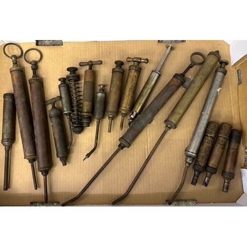 169 - A collection of motorcycle/car grease guns and oilers
