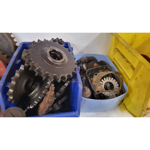 175 - A box of Norton spares to include front and rear sprockets, and smaller items including electrical p... 