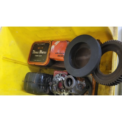 175 - A box of Norton spares to include front and rear sprockets, and smaller items including electrical p... 