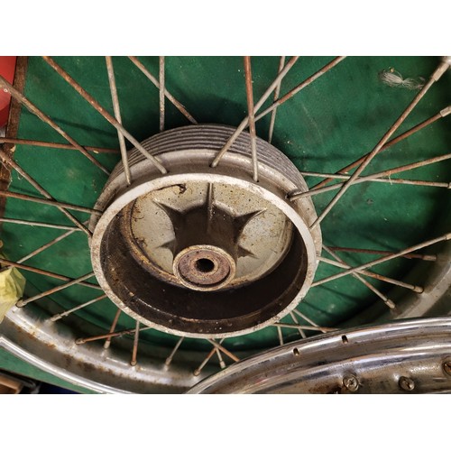 180 - A pair of motorcycle wheels, possibly NSU, together with another pair (4)
