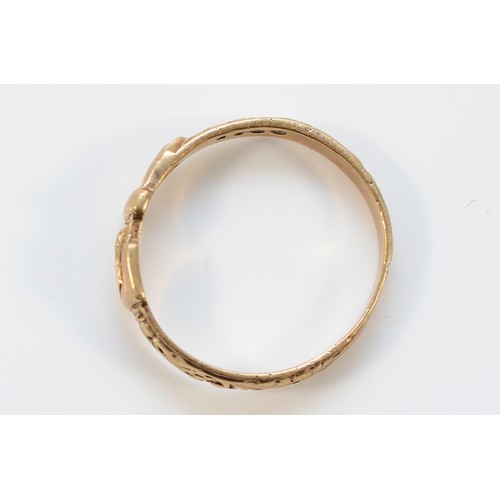 4 - A 9ct gold patterned buckle ring, London 1980, N, 1.8g
