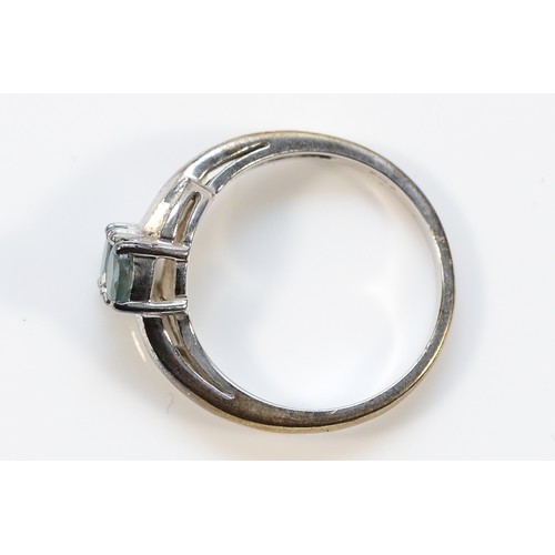 20 - A 9ct white gold green sapphire and diamond dress ring, N, 2.9g