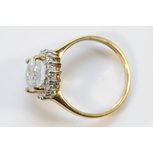 23 - A QVC 9ct gold aquamarine and brilliant cut diamond cluster ring, 10mm x 8mm aquamarine, M, 2.9g