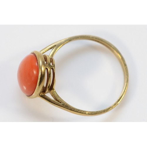 28 - A 333 gold coral dress ring, 13mm x 10mm coral, Q, 3.1g