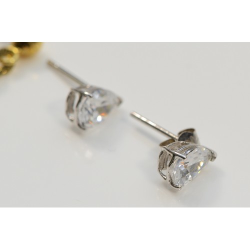 45 - A pair of 9ct gold drop earrings, with a pair of 9ct white gold cubic zirconia earrings with scroll ... 