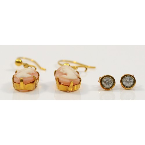 46 - A pair of 9ct gold shell cameo drop earrings, with a pair of 9ct gold cubic zirconia earrings with s... 