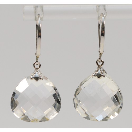 47 - Uri Gellar, a pair of 9ct white gold white gemstone drop earrings with lever backs, 6g