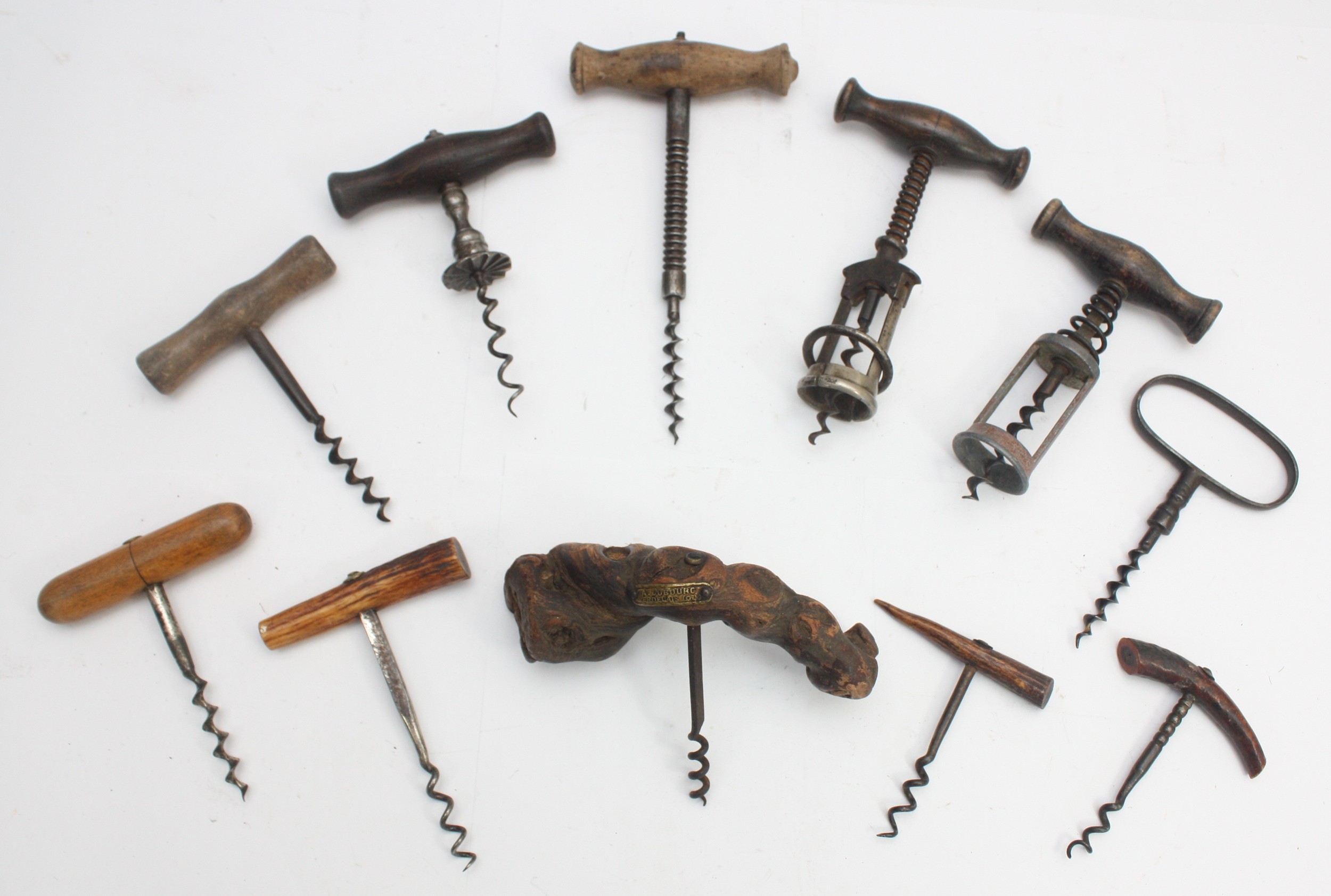 A collection of ten early 20th century and later corkscrews, to include ...
