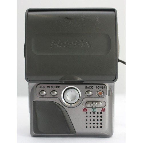 A Fujifilm Finepix M603 digital camera.