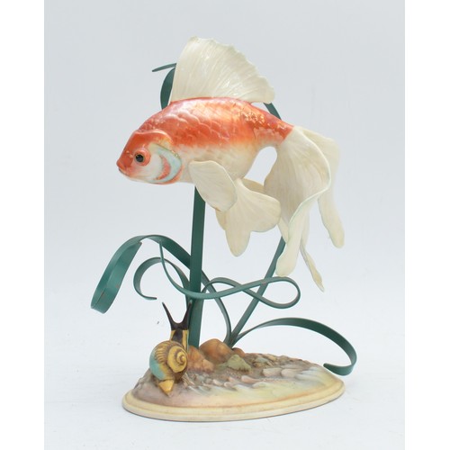 A Franklin Mint model 'The Golden Carp' by William Kazmar, circa 1987, 23cm tall.