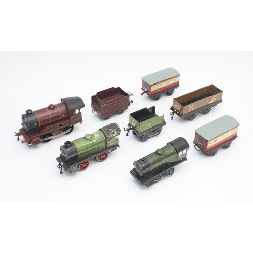 6 - Hornby Railways; 0 Gauge; a quantity of track, together with three locomotives, 60985 and C600. (1 b... 