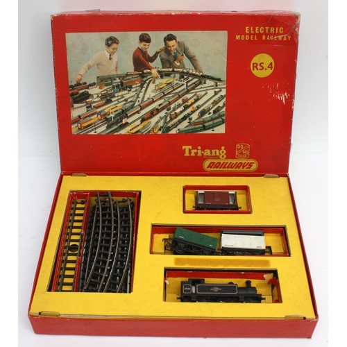 13 - Three boxed train sets to include, Playcraft OO/HO gauge railway layout, Tri-ang OO/HO gauge electri... 