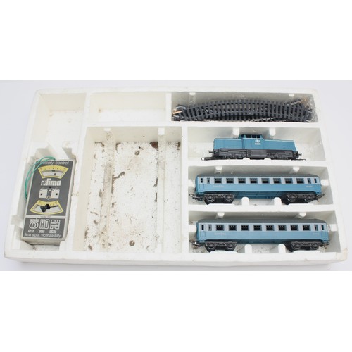 13 - Three boxed train sets to include, Playcraft OO/HO gauge railway layout, Tri-ang OO/HO gauge electri... 