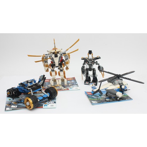 42 - Lego; A group of three Lego 'Ninjago Legacy' ready built models, together with a Lego City helicopte... 
